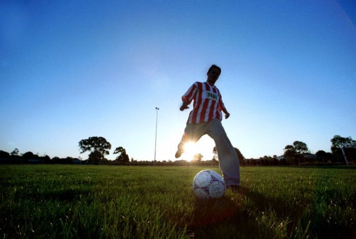 Youth playing soccer