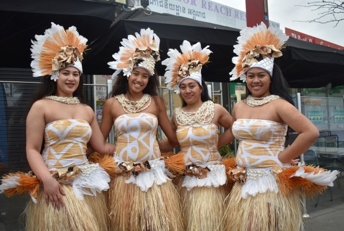 Four dancers in traditional dress