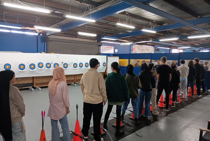 Young people at archery holiday activity 