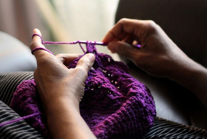 person doing crochet