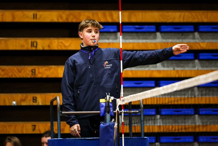 Image of young person being a refereeing 