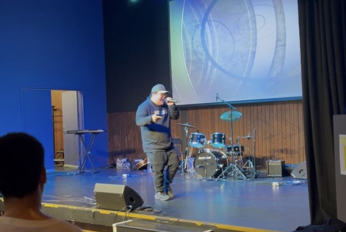 Yong person rapping on stage