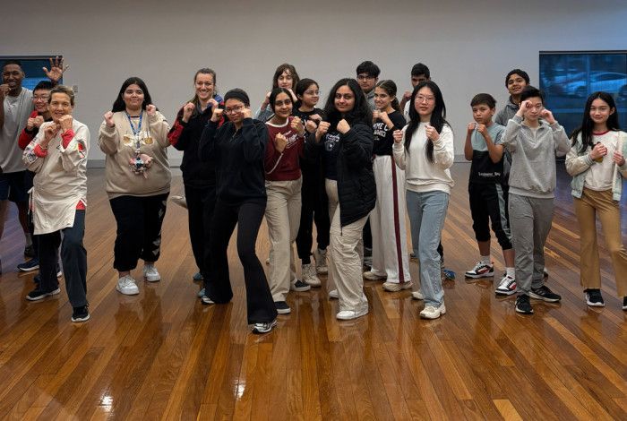 Group of people punching in the air