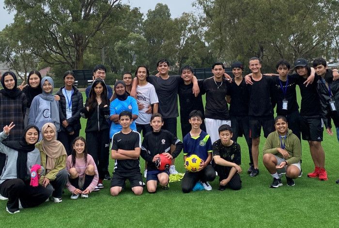 Group of soccer players smiling