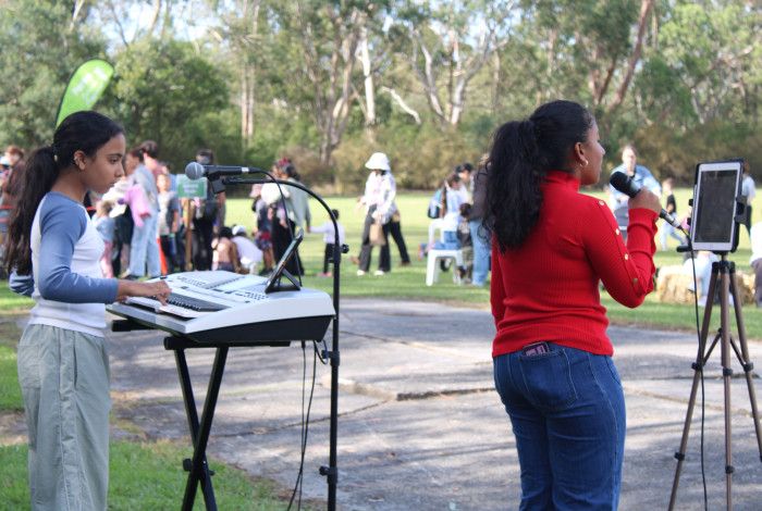 A keyboard player and singer at an Open Mic performance