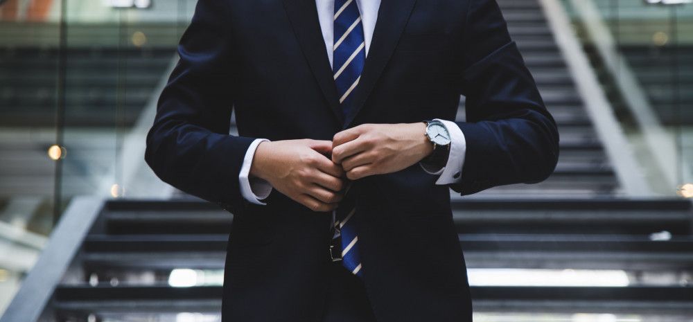 Person dressed in suit for job interview