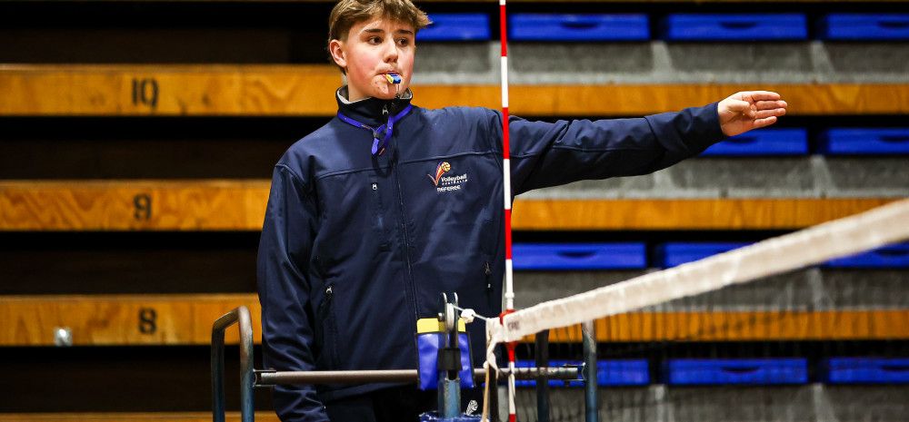 Image of young person being a refereeing