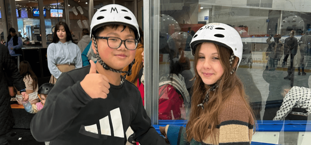 young people at ice skating activity
