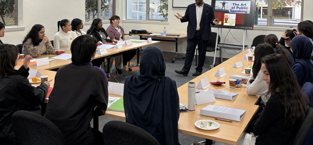 Image of young people listening to facilitator