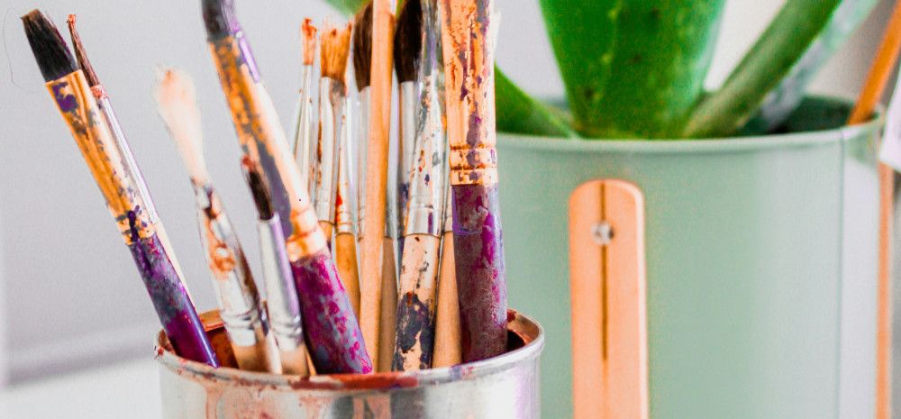 Paint brushes and plant