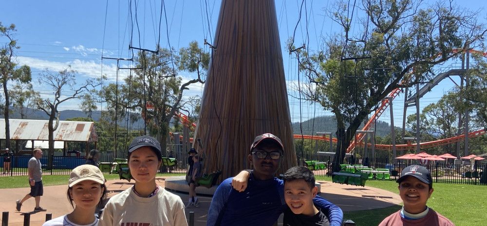 Group of young people smiling at Gumbuya World