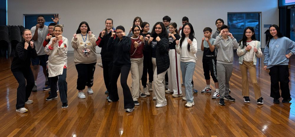Group of people punching in the air