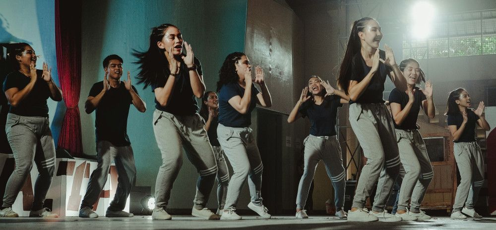 group of young people dancing