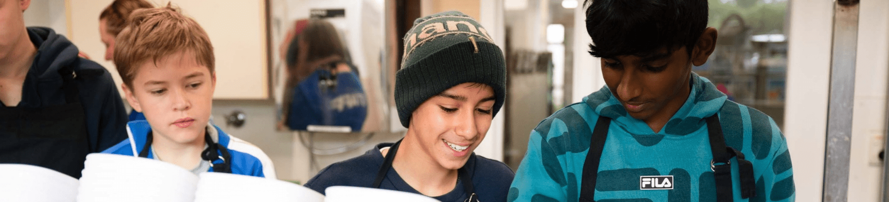 young people cooking together