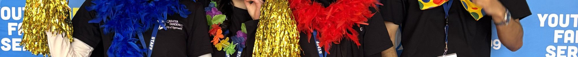 Young people standing and smiling