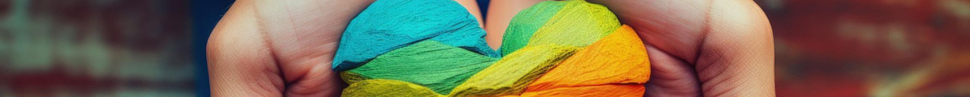 Someone holding a wooden love heart