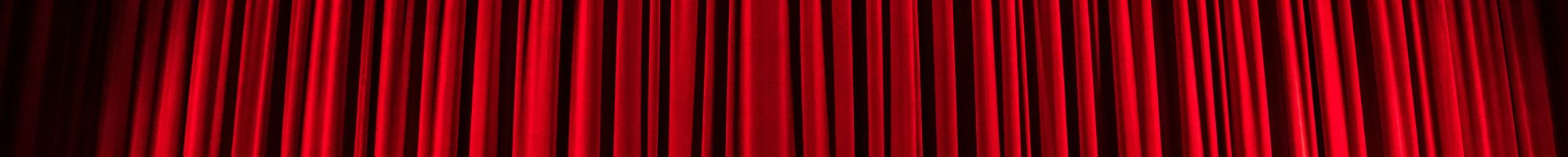 Image of a red theatre curtain.
